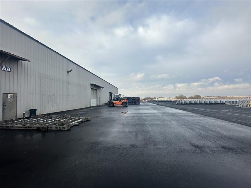 warehouse-exterior Organized pallet racking with location-coded bins