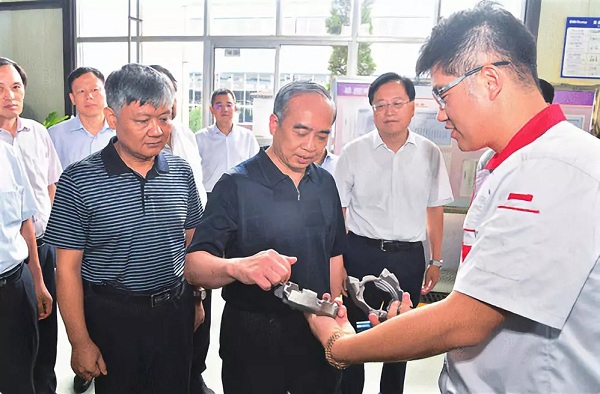 10.常务副省长林武莅临我司查抄领导转型项目建设工作.jpg